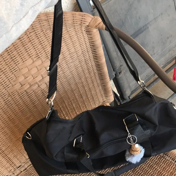 Black Women's Travel Duffel Bag with Pom Keychain - Picture 7 of 8